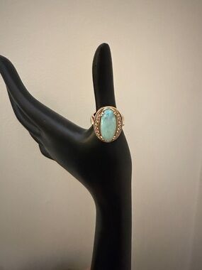 Gorgeous Gold Ring with Light Blue Opal  Stone. 14 natural cut  diamonds.